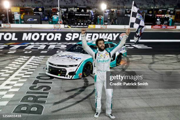 Chase Elliott, driver of the UniFirst Chevrolet, celebrates after winning the NASCAR Cup Series All-Star Race at Bristol Motor Speedway on July 15,...