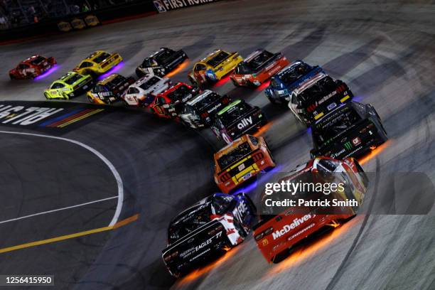Cars race during the NASCAR Cup Series All-Star Race at Bristol Motor Speedway on July 15, 2020 in Bristol, Tennessee.