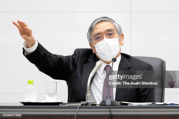 Bank of Japan Governor Haruhiko Kuroda speaks during a press conference following a monetary policy meeting at the BOJ headquarters on July 15, 2020...