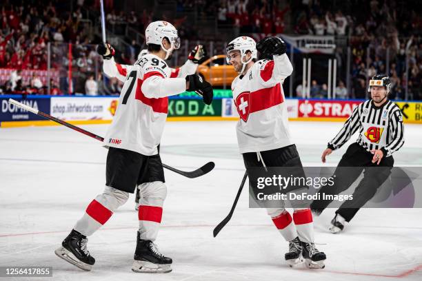 Jonas Siegenthaler of Switzerland and Nico Hischier of Switzerland celebrates after scoring 1-1 during the 2023 IIHF Ice Hockey World Championship...