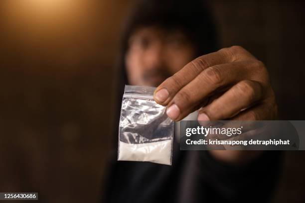 heroin,man is taking heroin, drug addict, disease - drugs cocaine stock pictures, royalty-free photos & images