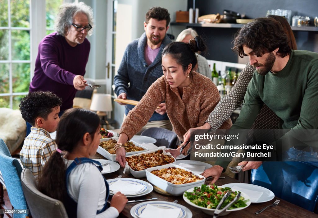 Extended family having meal together