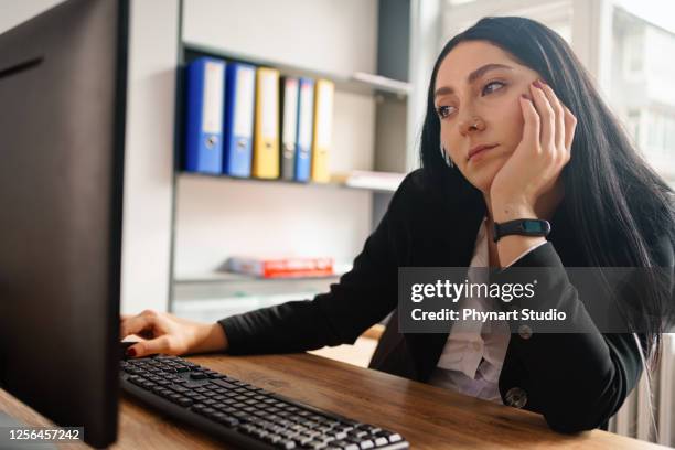 bored executive at office - low confidence stock pictures, royalty-free photos & images