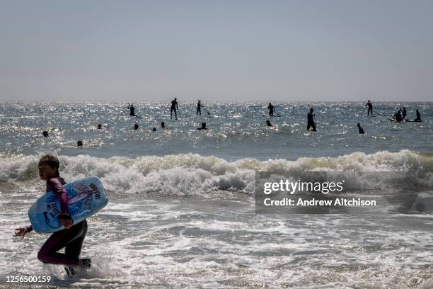 Surfers Against Sewage were joined by local surfers, paddle boarders and sea swimmers for a Paddle Out on Sunny Sands beach to protest about the...