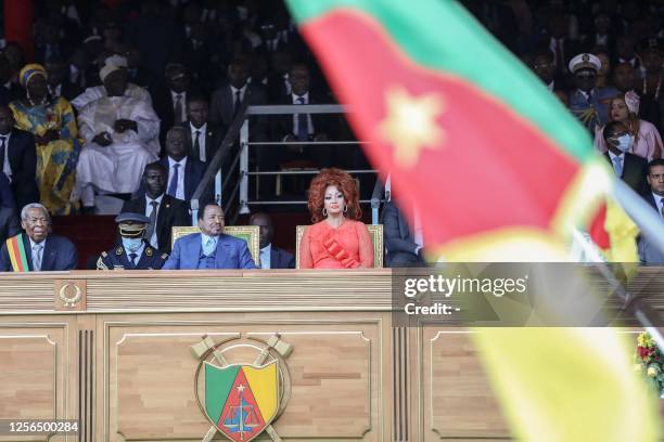 Cameroon President Paul Biya , and his wife Chantal Biya , react during the May 20 parade marking the 51st celebration of Unity Day in Yaounde on May...