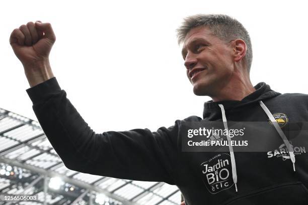 La Rochelle's Irish coach Ronan O'Gara celebrates after winning the European Champions Cup final rugby union match against Leinster at the Aviva...