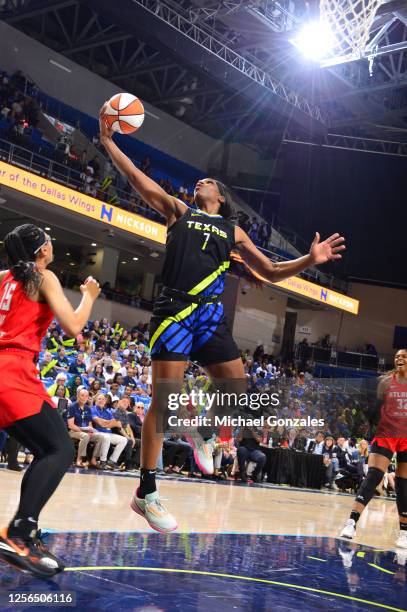 Teaira McCowan of the Dallas Wings grabs the rebound during the game against the Atlanta Dream on May 20, 2023 at the College Park Center in...