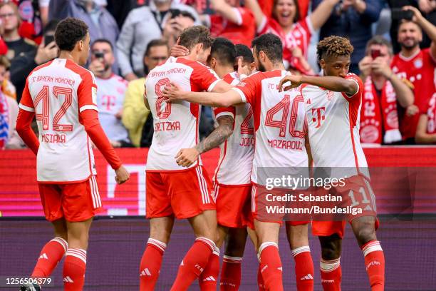 Players of FC Bayern München are celebrating the first goal by Serge Gnabry during the Bundesliga match between FC Bayern München and RB Leipzig at...