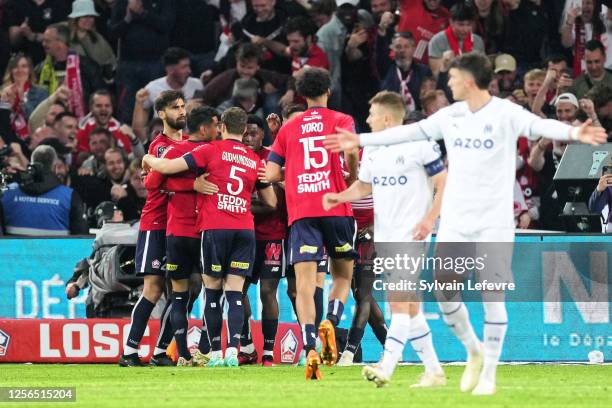 Jonathan David of Lille OSC celebrates after scoring his side's first goal during the Ligue 1 match between Lille OSC and Olympique Marseille at...