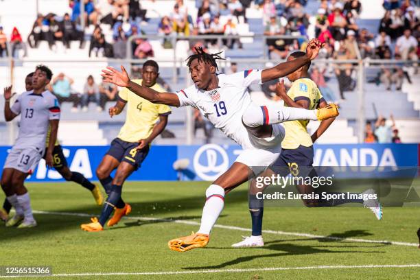 Darren Yapi of United States attempts a kick while being defended by Goalkeeper Gilmar Napa of Ecuador during FIFA U-20 World Cup Argentina 2023...