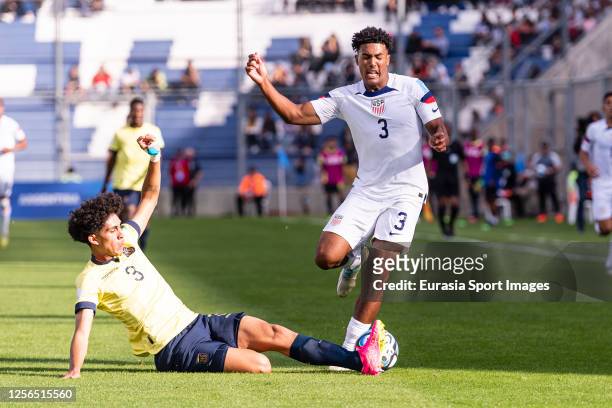 Caleb Wiley of United States is challenged by Christian Garcia of Ecuador during FIFA U-20 World Cup Argentina 2023 Group B match between USA and...