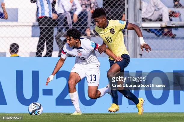 Jonathan Gomez of United States is chased by Nilson Angulo of Ecuador during FIFA U-20 World Cup Argentina 2023 Group B match between USA and Ecuador...