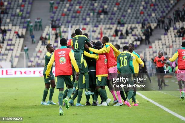 Senegal's players celebrate after winning the U17 Africa Cup of Nations final match between Senegal and Morocco at Nelson Mandela Stadium in Algiers,...