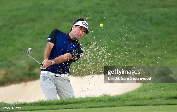 Bubba Watson of the United States plays a shot from a bunker on the 14th hole during the first round of The Memorial Tournament on July 16, 2020 at...
