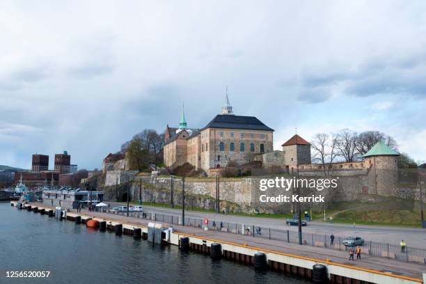 oslo norway - akershus festning - harbor with old castle - akershus festning stock pictures, royalty-free photos & images