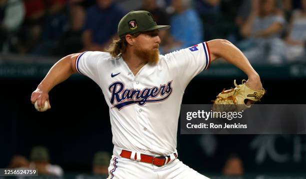 Jon Gray of the Texas Rangers pitches against the Colorado Rockies during the second inning at Globe Life Field on May 20, 2023 in Arlington, Texas.