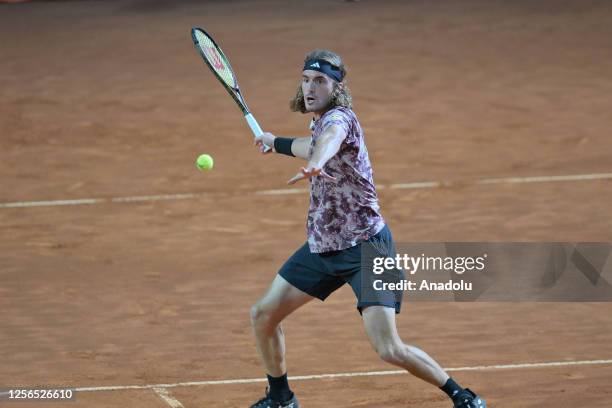 Stefanos Tsitsipas is in action against Daniil Medvedev of during the men's single semi final match with in the Internazionali BNL d'Italia at the...