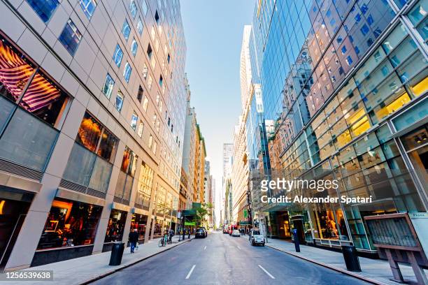 street in midtown manhattan, new york city, usa - retail place stock pictures, royalty-free photos & images