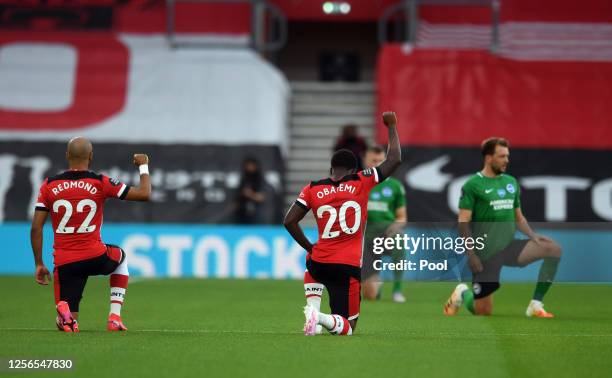 Michael Obafemi of Sheffield United takes a knee in support of the black lives matter movement during the Premier League match between Southampton FC...