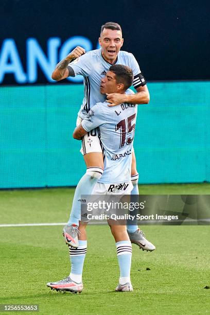 Iago Aspas of Celta de Vigo celebrates with Lucas Olaza after scoring his team's second goal during the Liga match between RC Celta de Vigo and...