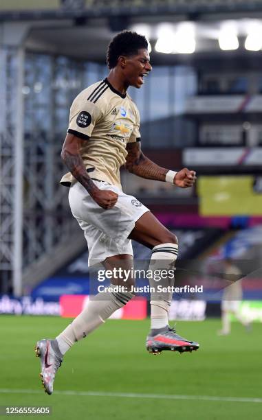 Marcus Rashford of Manchester United celebrates after scoring his sides first goal during the Premier League match between Crystal Palace and...