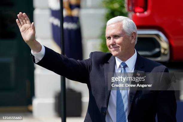 Vice President Mike Pence waves as he arrives for a speech by President Donald Trump on the South Lawn of the White House on July 16, 2020 in...