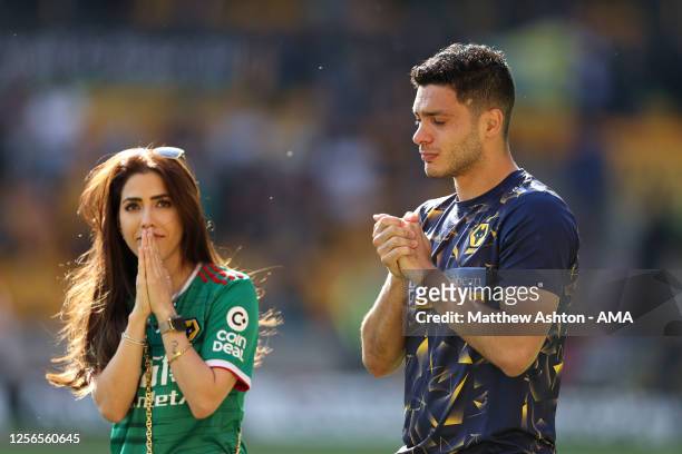 An emotional Raul Jimenez and his girlfriend, Daniela Basso walk around the pitch on the last home game of the season during the Premier League match...