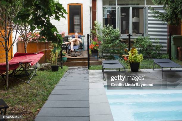 back yard with a small swimming pool - backyard shed stock pictures, royalty-free photos & images