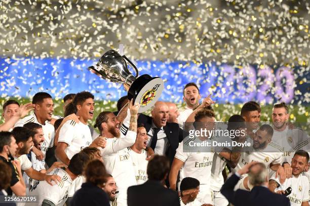 Sergio Ramos the Madrid captain lifts the La Liga trophy during the Liga match between Real Madrid CF and Villarreal CF at Estadio Alfredo Di Stefano...