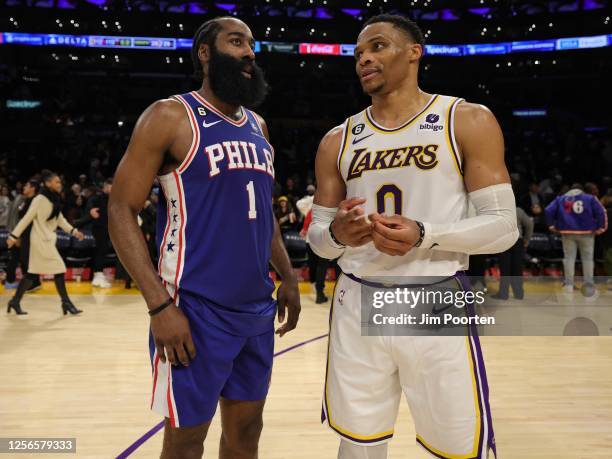 Russell Westbrook of the Los Angeles Lakers speaks with James Harden of the Philadelphia 76ers after the game on January 15, 2023 at Crypto.Com Arena...