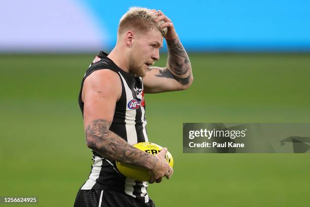 Jordan De Goey of the Magpies looks on during the round 7 AFL match between the Geelong Cats and the Collingwood Magpies at Optus Stadium on July 16,...