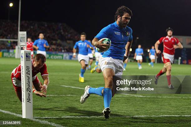 Luke McLean of Italy scores their seventh try during the IRB 2011 Rugby World Cup Pool C match between Italy and Russia at Trafalgar Park on...
