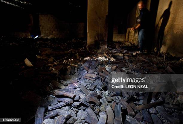 Large pile of ammunition magazines are shown in a former government weapons store in central Tripoli on September 19, 2011. During the fall of...