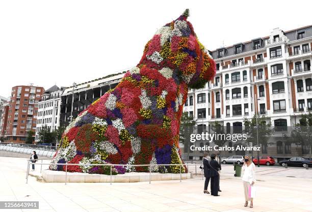 Floral sculpture called Puppy by Jeff Koons stands guard at the doors of the Guggenheim Museum in Bilbao ahead of the arrival by King Felipe of Spain...