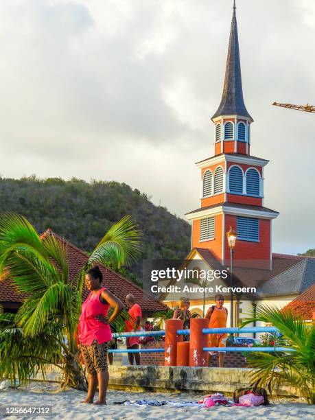 sunset in anse-d'arlet, martinique - martinique beach stock pictures, royalty-free photos & images
