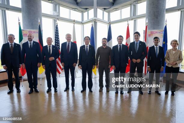 Ukraine's President Volodymyr Zelensky poses with G7 leaders for a family photo during the G7 Leaders' Summit in Hiroshima on May 21, 2023.