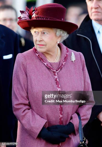 Queen Elizabeth II visits a New Zealand tourism exhibition, housed in a giant inflatable rugby ball, near Tower Bridge on November 25, 2008 in...