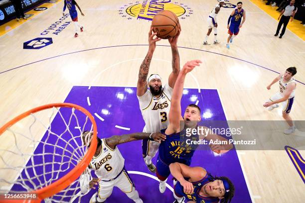 Anthony Davis of the Los Angeles Lakers goes up for the rebound against the Denver Nuggets during Game Three of the Western Conference Finals on May...