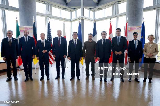 Ukraine's President Volodymyr Zelensky poses with G7 leaders for a family photo during the G7 Leaders' Summit in Hiroshima on May 21, 2023.