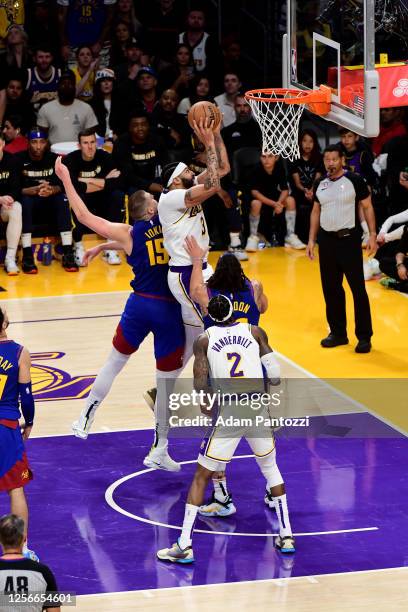 Anthony Davis of the Los Angeles Lakers drives to the basket against the Denver Nuggets during Game Three of the Western Conference Finals on May 20,...