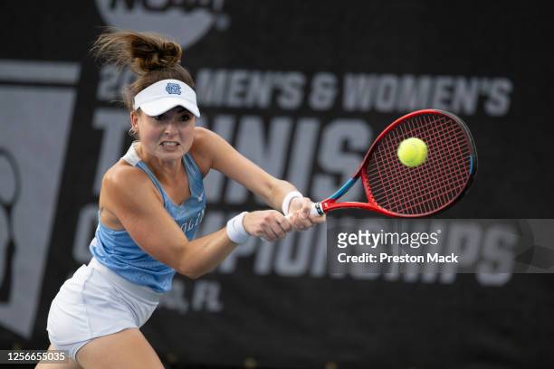 Fiona Crawley of North Carolina hits a backhand during the Division I Women's Tennis Championship between North Carolina and NC State held at the...