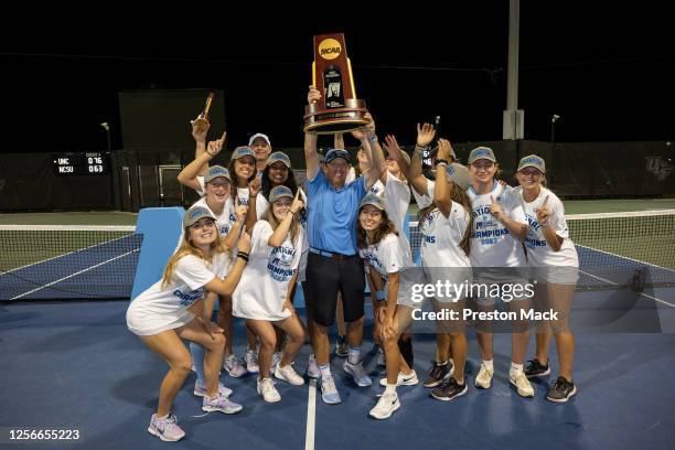 The North Carolina Women's Tennis team poses with the National Championship Trophy after winning the NCAA Division I Women's Tennis National...