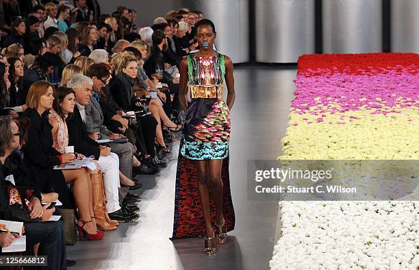 Model walks down the catwalk during the Mary Katrantzou Runway show at London Fashion Week Spring/Summer 2012 on September 20, 2011 in London, United...