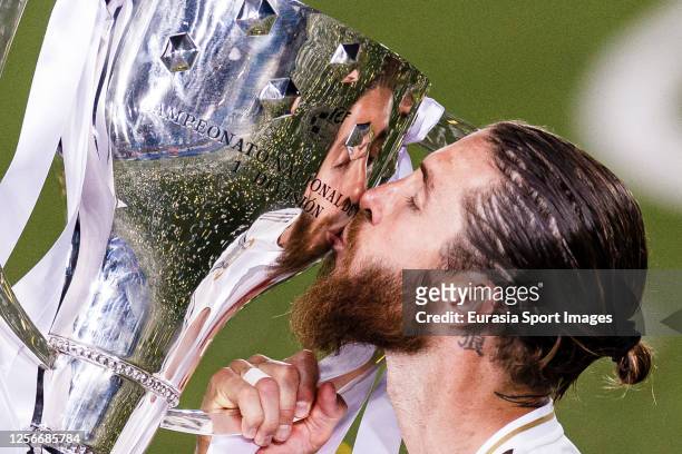 Sergio Ramos of Real Madrid kisses La Liga trophy after the La Liga match between Real Madrid CF and Villarreal CF at Estadio Alfredo Di Stefano on...