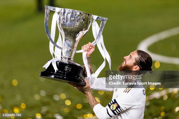 Real Madrid's Captain Sergio Ramos lifts La Liga trophy during La Liga match between Real Madrid CF and Villarreal CF at Estadio Alfredo Di Stefano...