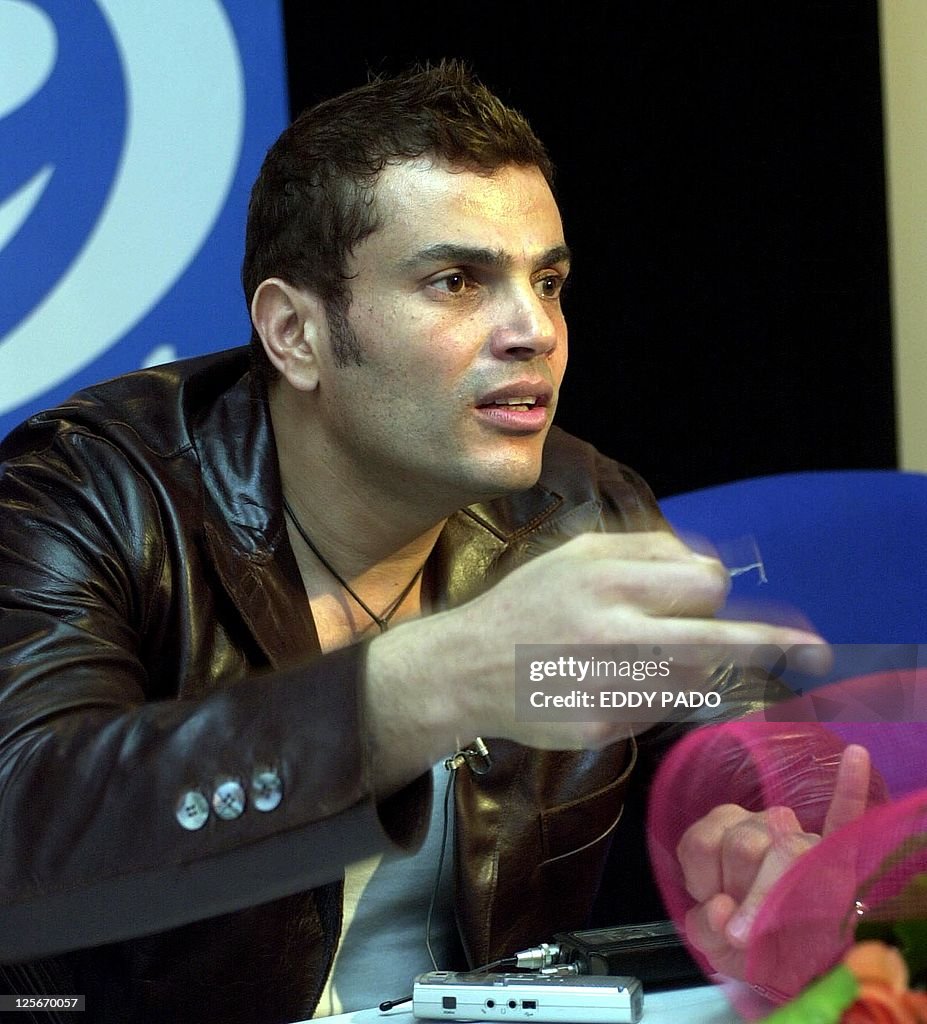 Amro Rabi Egyptian singer Amro Diab gestures during a press conference in Dubai ...