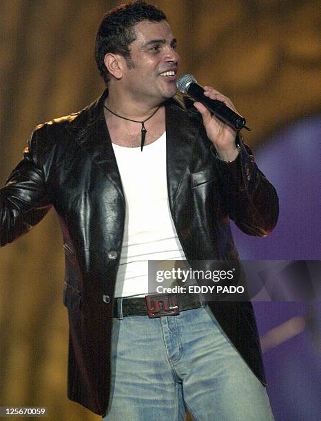 Egyptian singer Amro Diab performs in Dubai 15 February 2003. AFP PHOTO/Eddy PADO