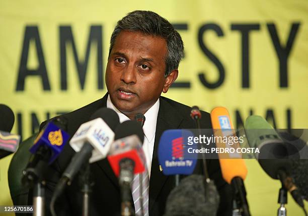 Amnesty International secretary general Salil Shetty speaks during a press conference at the journalists' syndicate in the Egyptian capital Cairo on...