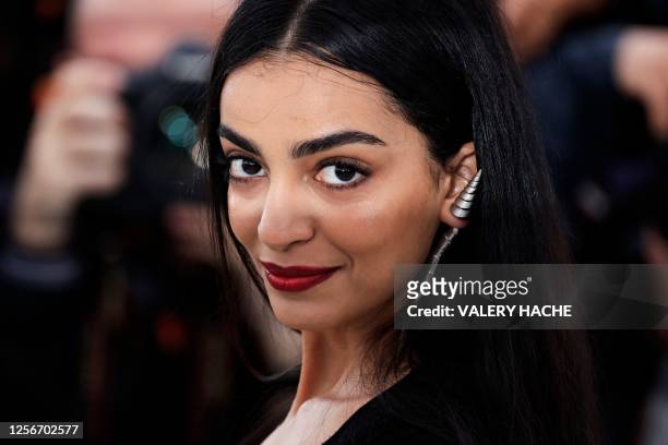 Actress Meriem Amiar poses during a photocall for the film "Omar la Fraise" at the 76th edition of the Cannes Film Festival in Cannes, southern...