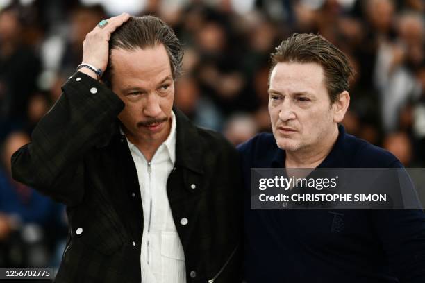 French actor Reda Kateb and French actor Benoit Magimel pose during a photocall for the film "Omar la Fraise" at the 76th edition of the Cannes Film...